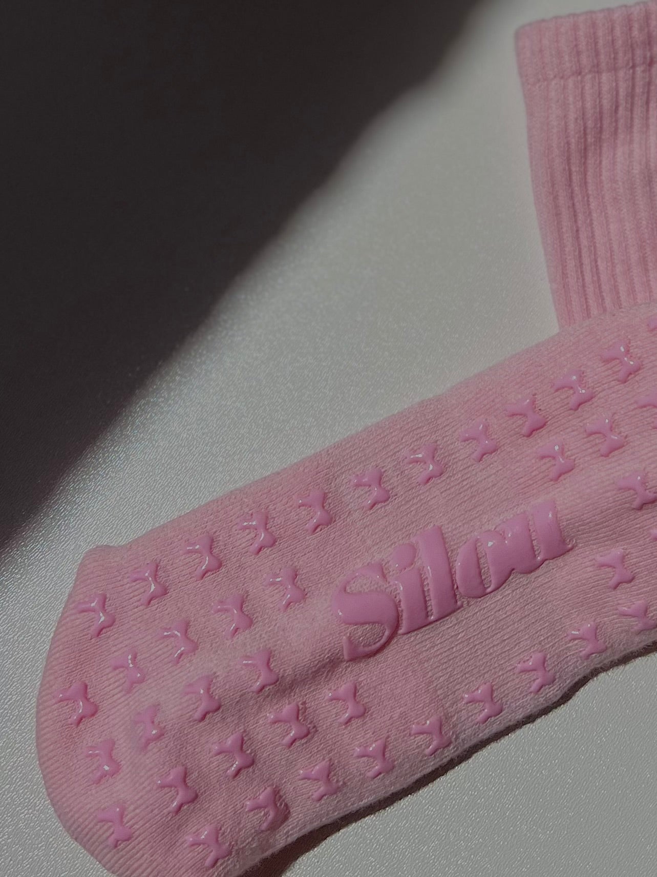 Pink bow grip socks