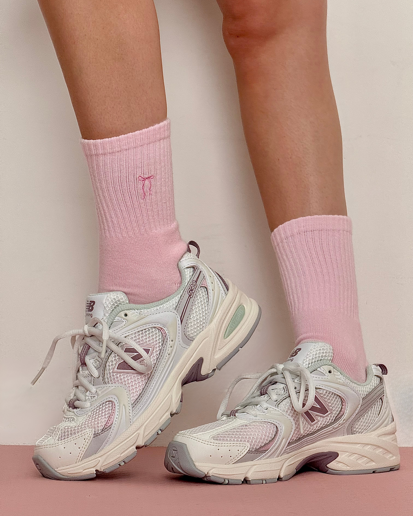 Pink bow grip socks